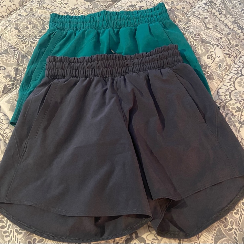 2 pair size extra small UNDER ARMOUR GREEN AND GREY RUNNING SHORTS